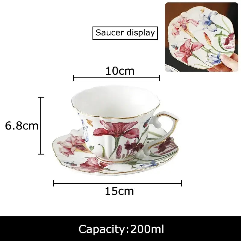 A delicate porcelain mug set featuring decorbites iris pattern with vibrant pink purple and blue florals on white background