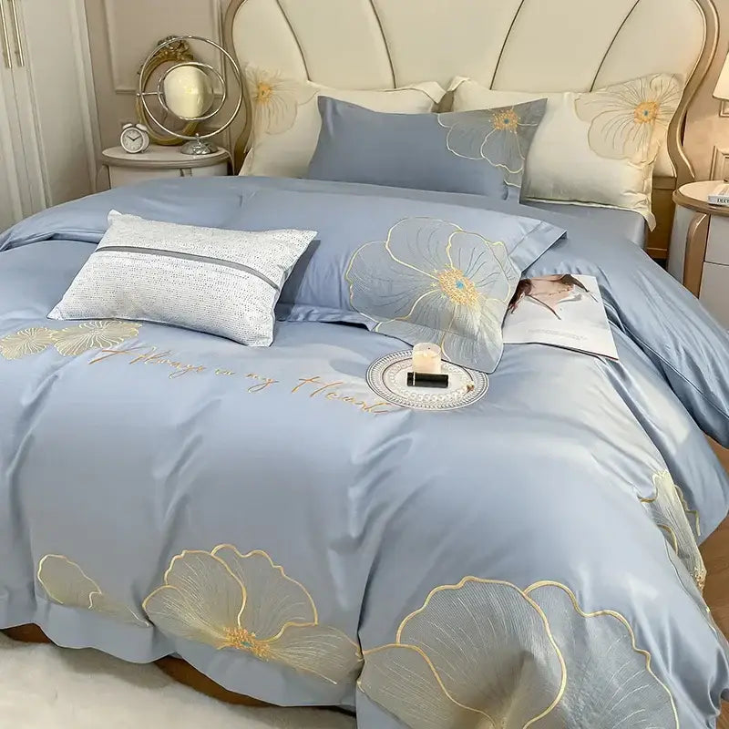 Light blue satin duvet set with embroidered egyptian cotton gold floral patterns and always in my heart stitching