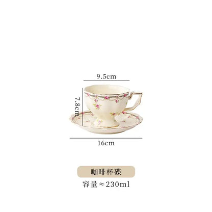 Delicate cream-colored porcelain tea set with soft pink floral pattern and gold trim for elegant dining rooms