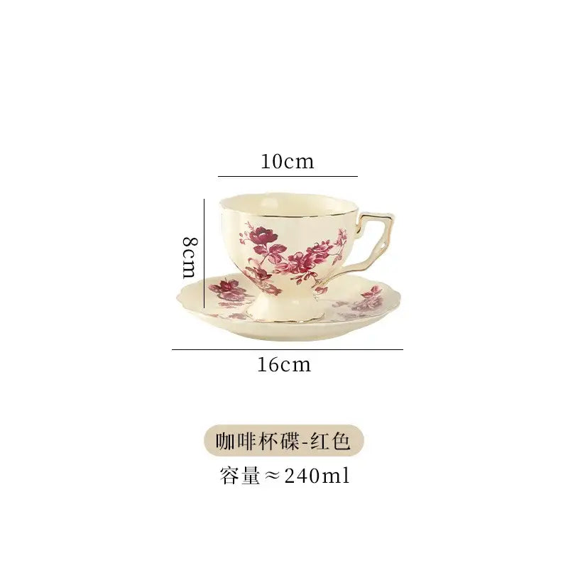 Cream-colored porcelain tea set with delicate red floral patterns and gold trim ideal for dining room use
