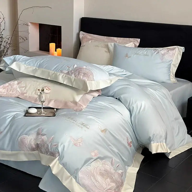 Light blue satin bedding set with pink cream floral embroidery and butterflies decorbites 1000tc egyptian cotton