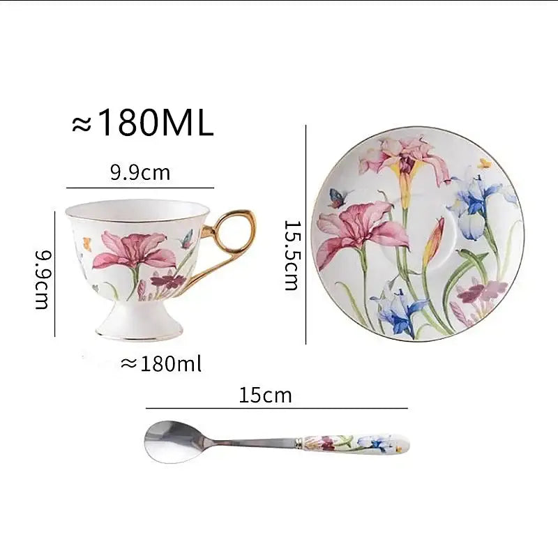 Delicate porcelain lily flower tea set with vibrant pink and blue iris flowers and butterflies on white background