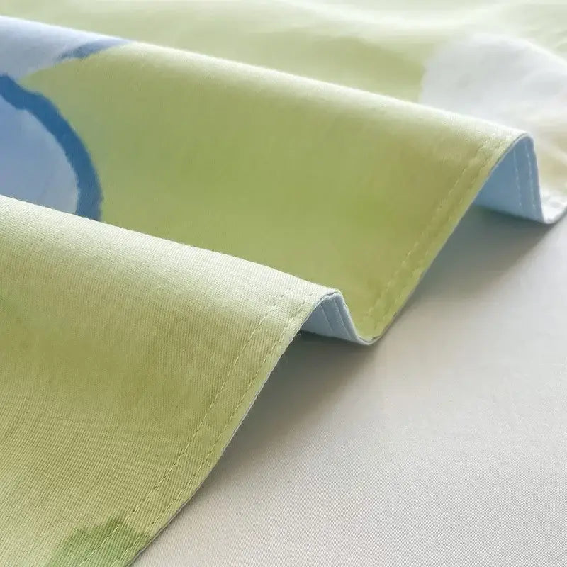 Light green floral mint green cotton duvet cover with subtle blue and white pattern and neatly stitched edges decorbites cotton duvet