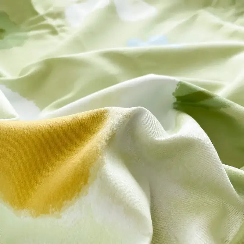 Soft flowing floral mint green cotton duvet cover featuring a gentle gradient and vibrant yellow accent for bedding decorbites cotton duvet