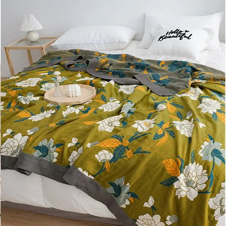Olive green floral throw blanket with white blossoms teal yellow leaves and gray border decorbites cotton throw blanket