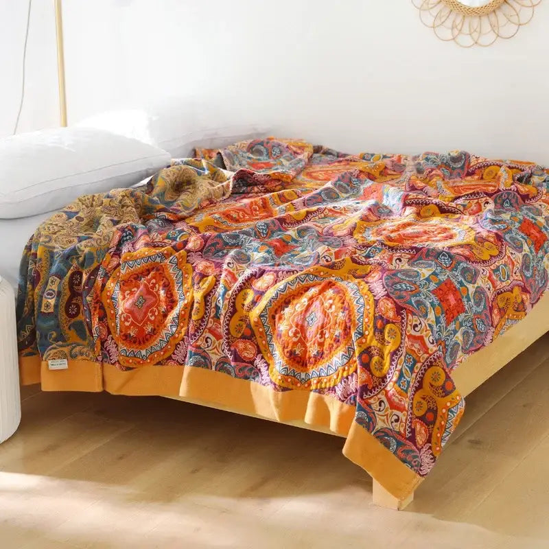 Vibrant orange and blue paisley-patterned decorbites cotton throw blanket with soft textured fabric for bedroom decor