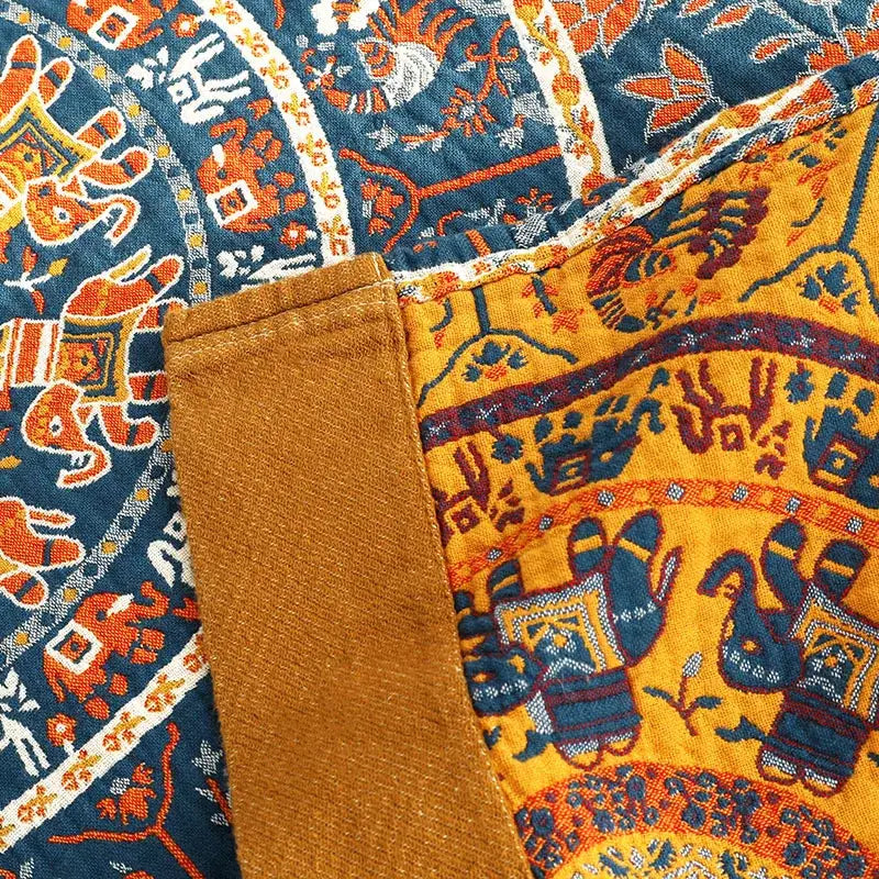 Floral navy and orange cotton picnic blanket bedspread with vibrant orange and navy embroidered elephant motifs decorbites cotton picnic