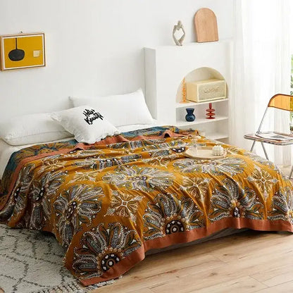 A mustard-yellow decorbites cotton summer throw blanket with floral and paisley patterns for bedroom decor