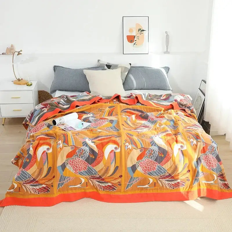 Floral orange and blue cotton summer throw blanket featuring a vibrant orange and red bird-patterned design for decorbites cotton summer use