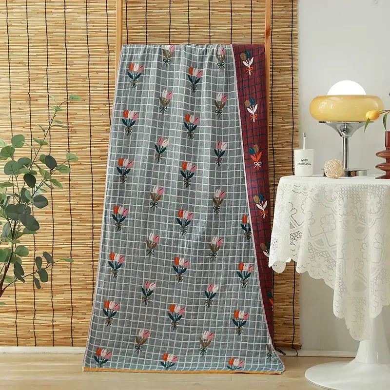 Floral orange and pink cotton gauze adult bath towels with gray maroon embroidered tulips and plaid border decorbites cotton gauze