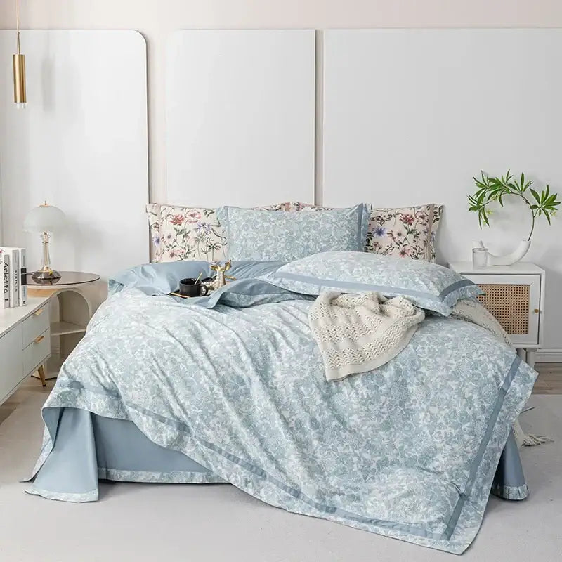 Light blue floral-patterned bedding set with delicate lace trim made from soft decorbites 100s egyptian cotton fabric