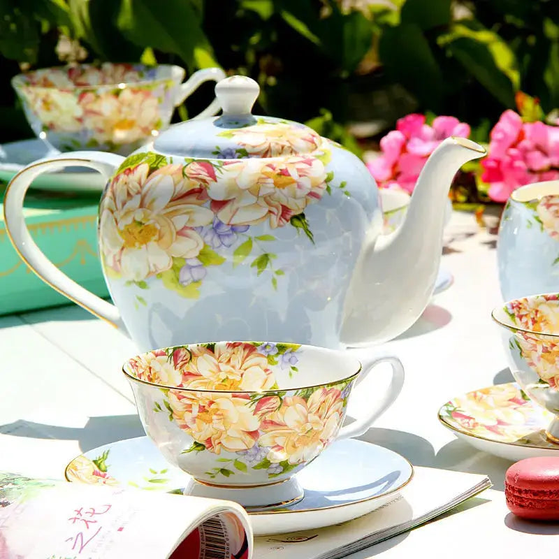 A delicate porcelain tea set teapot with a light blue base and floral patterns for afternoon tea decorbites ceramic afternoon