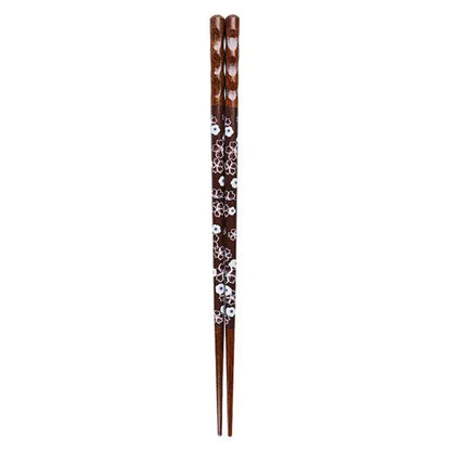 Dark brown bamboo wood chopsticks with white floral patterns and textured tips for an enhanced dining experience