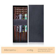 Set of eight bamboo wood chopsticks with floral patterned handles in a black gift box for enhanced dining experience