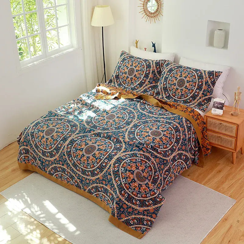 Floral pink and blue cotton gauze towel blanket with vibrant blue and orange mandala pattern and golden border decorbites cotton gauze
