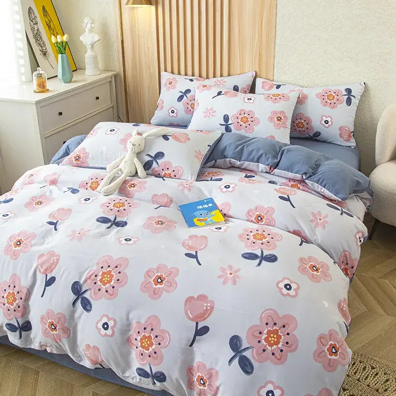 Floral pink and blue flower print bedding set with soft cotton fabric for a comfortable bedroom decor