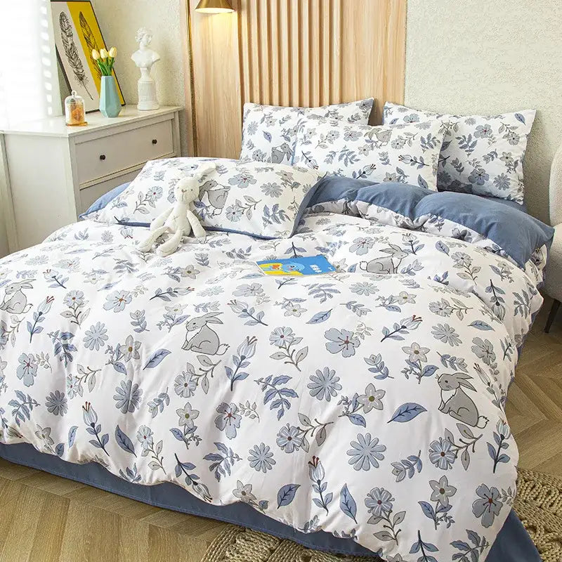 White and blue floral bunny-themed bedding set with soft cotton fabric featuring flower print for bedroom use