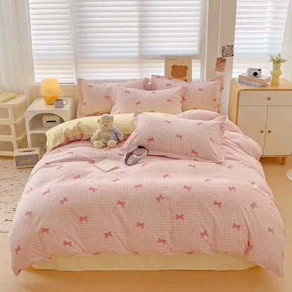 Floral pink and blue rose cotton printed bedding set featuring a pink and white gingham duvet with small pink bows by decorbites cotton printed cotton printed bedding