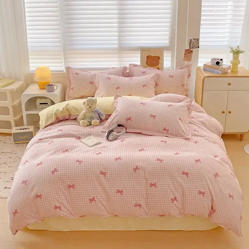 Floral pink and blue rose cotton printed bedding set featuring a pink and white gingham duvet with small pink bows by decorbites cotton printed cotton printed bedding