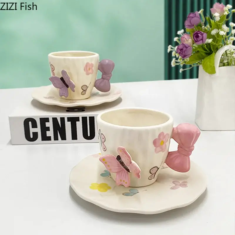 Ceramic cup and saucer set with pink and purple butterfly handles and floral patterns by decorbites bowknot ceramic