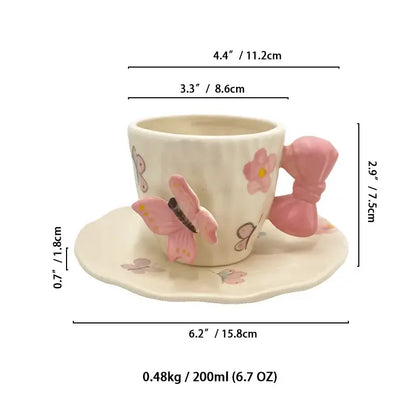 Cream-colored ceramic cup with pink butterfly and bowknot handle floral design in decorbites bowknot ceramic saucer set