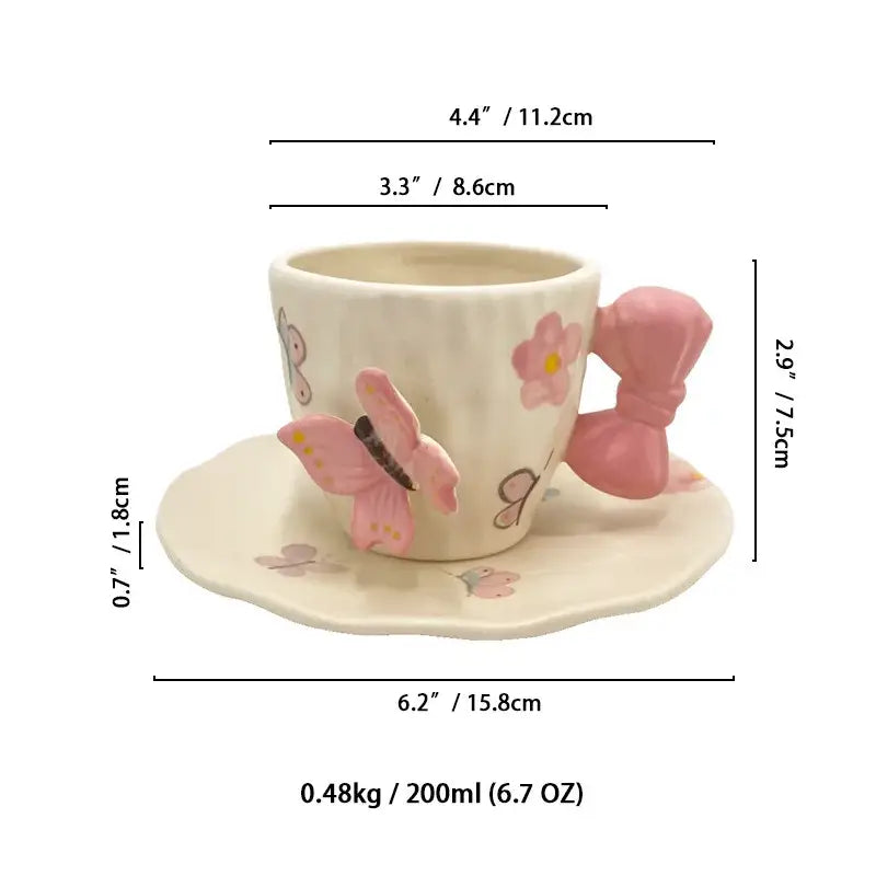Cream-colored ceramic cup with pink butterfly and bowknot handle floral design in decorbites bowknot ceramic saucer set