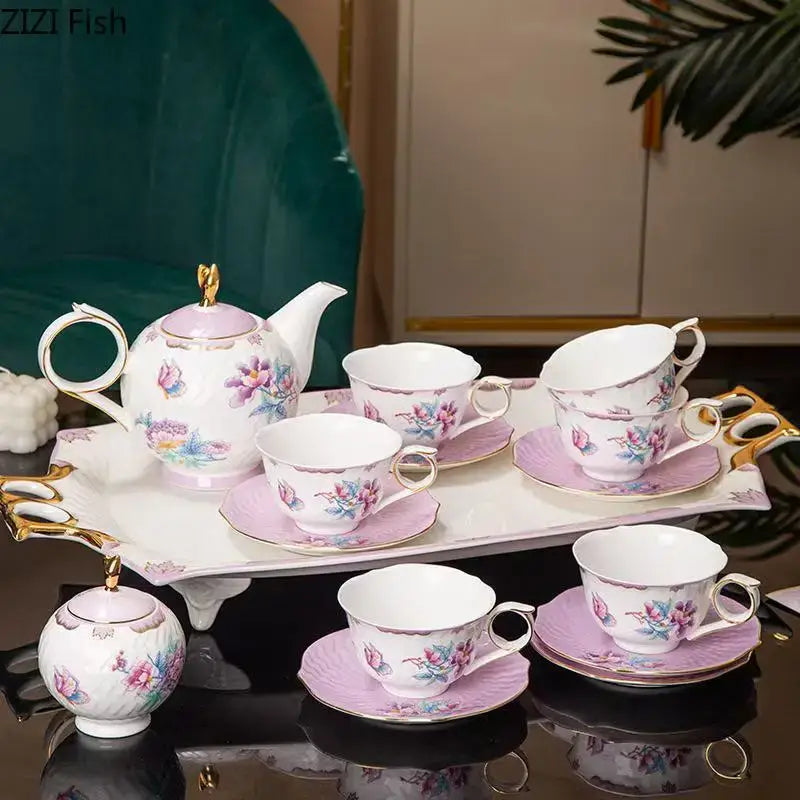 Floral pink and purple porcelain coffee mug set with gold trim featuring teapot cups saucers and sugar bowl on ornate tray