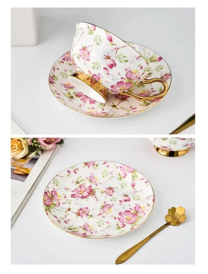 A delicate floral pink and purple porcelain tea cup set with gold trim perfect for dining room coffeeware