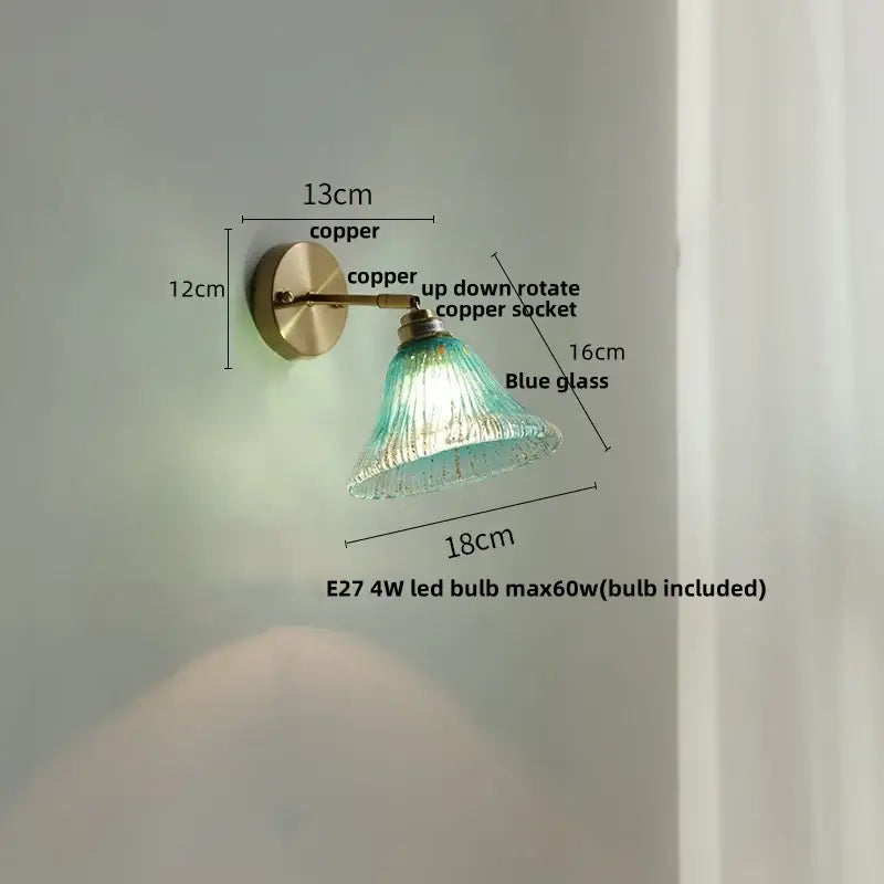 A vintage copper wall light with up-down rotatable decorbites butterfly glass socket and translucent blue shade