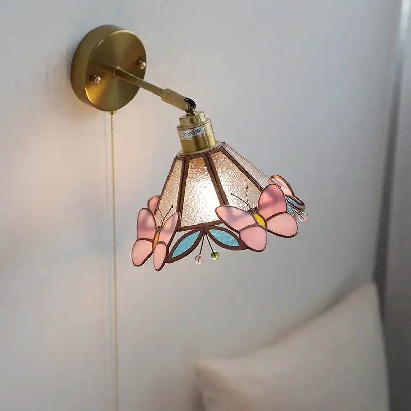 Delicate pink and blue decorbites butterfly glass wall light with brass mounting bracket for bedroom decor