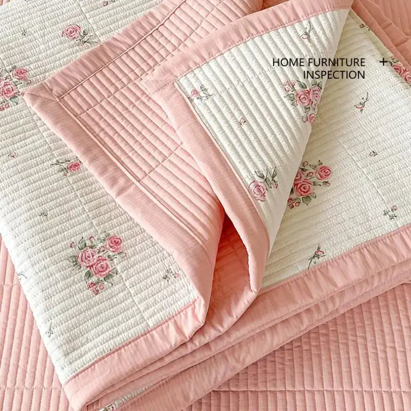 A soft pink and cream quilted bedspread with delicate rose embroidery for decorbites cartoon small fresh bed sheets