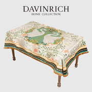 Elegant cream-colored floral print velvet tablecloth with botanical and swan motif tassels for dining room decor