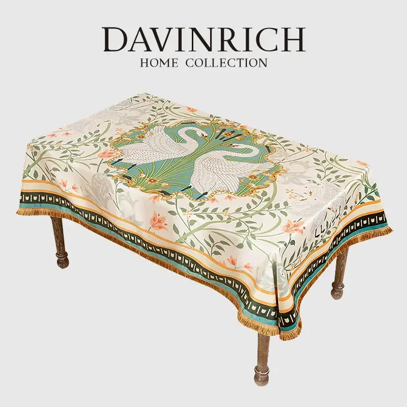 Elegant cream-colored floral print velvet tablecloth with botanical and swan motif tassels for dining room decor