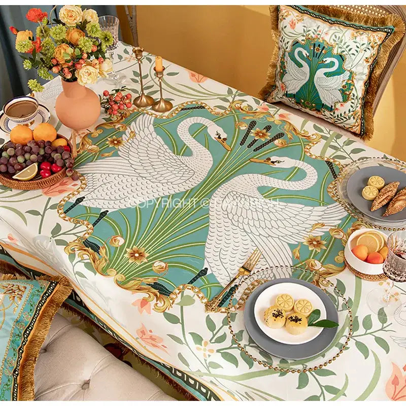 Elegant teal floral print velvet tablecloth with gold swan patterns and tassels for dining room decor