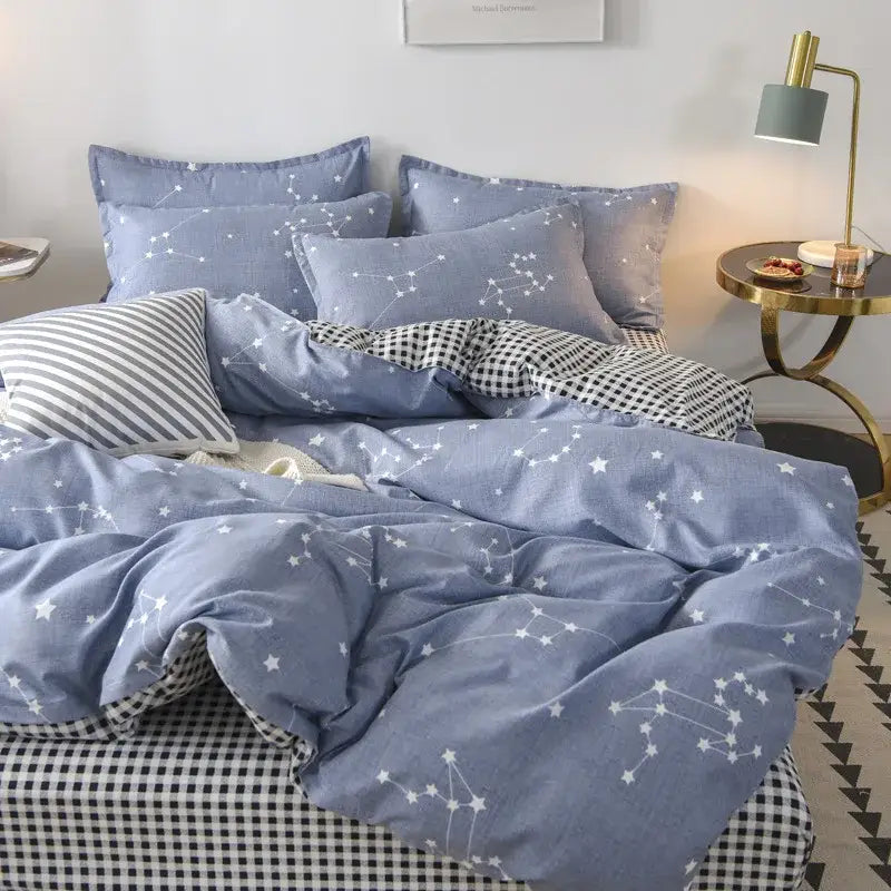 Floral puppy cotton printed bedding set featuring blue star constellation duvet with matching pillows and checkered bedsheet