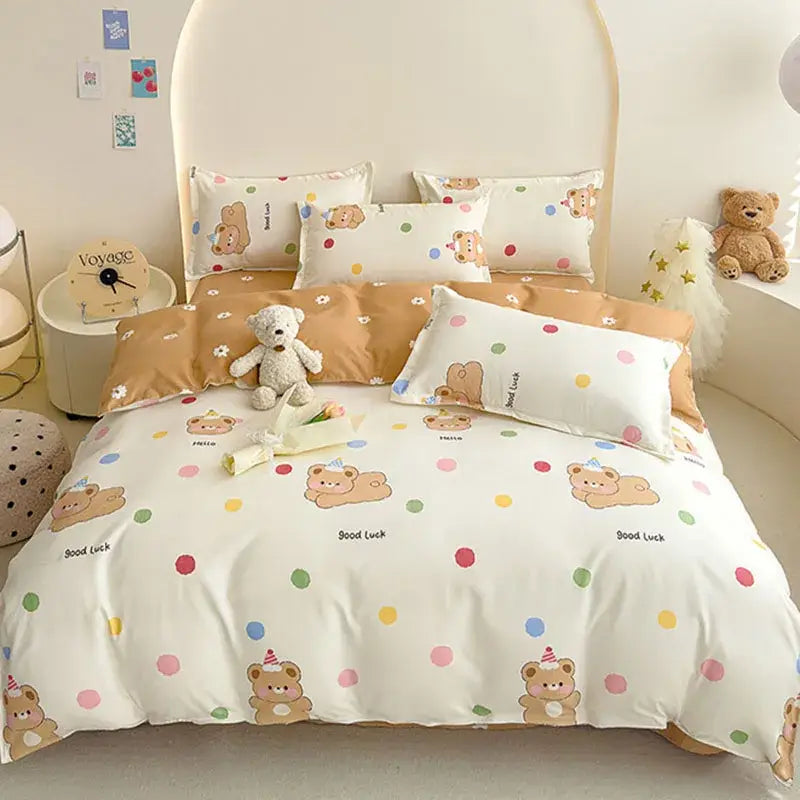 Cute white cotton printed bedding set with brown teddy bear, colorful polka dots, and good luck text by decorbites