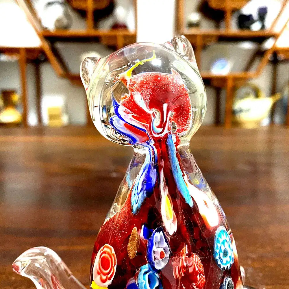 A vibrant floral red cat glass figurine with colorful patterns, perfect as cute cat glass decor for living room
