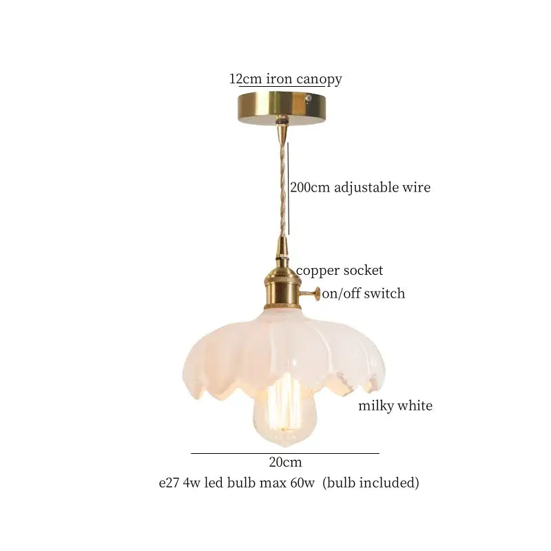 A delicate milky white glass pendant lamp with brass glass led hardware and an adjustable wire for bedroom decorbites use