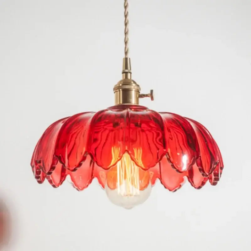 A vibrant red glass pendant lamp with petal design and decorbites brass glass led hardware for bedroom decor