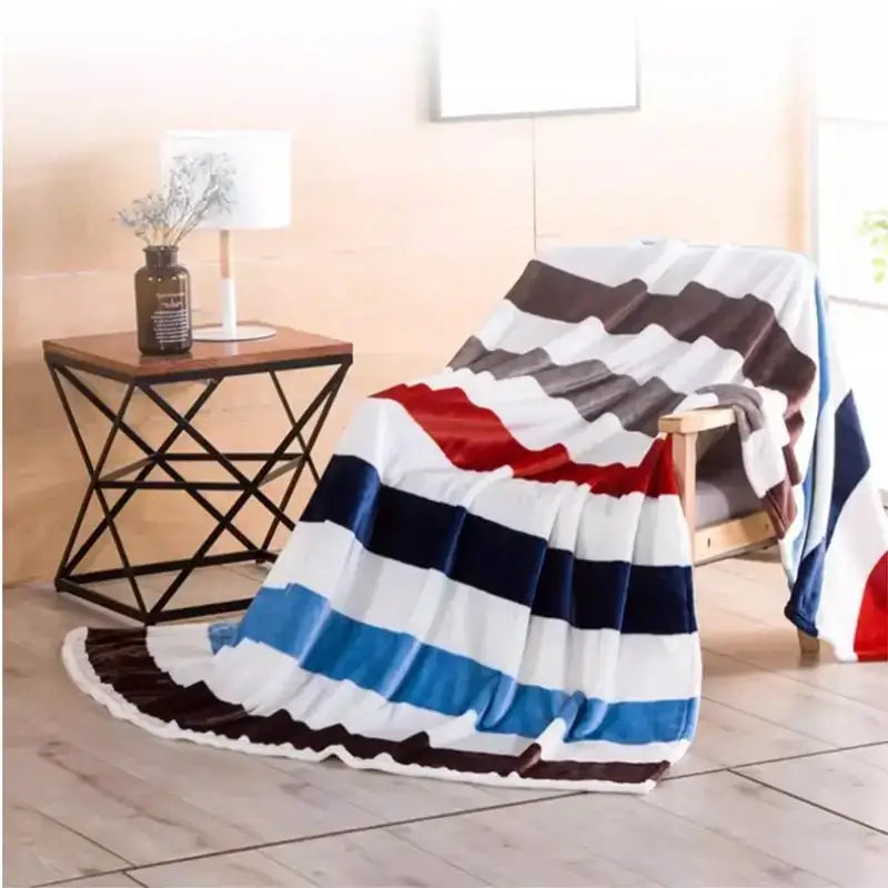 A cozy floral red and pink coral fleece flannel flower blanket with bold white navy blue red and brown stripes for decorbites coral fleece