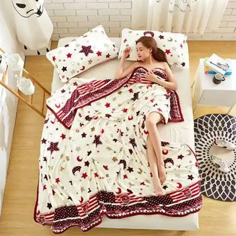 White and red star and moon patterned plush blanket with decorative border made of coral fleece flannel decorbites flower fleece