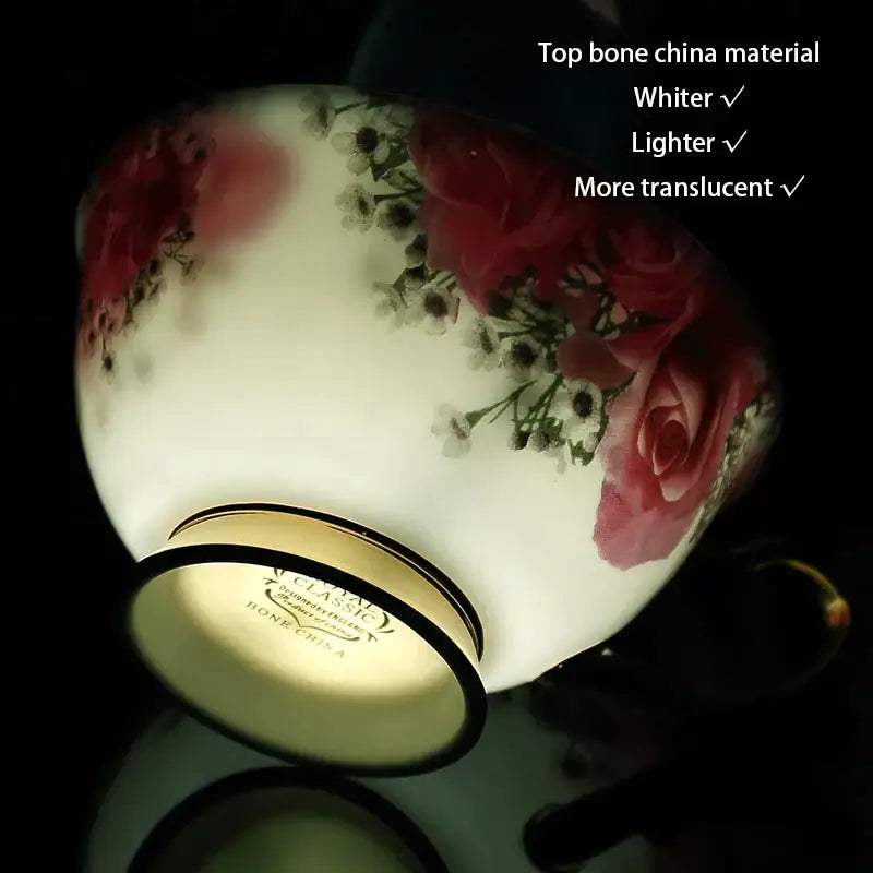 A delicate red rose floral bone china tea set teacup with soft white base and gold-trimmed rim by decorbites bone china