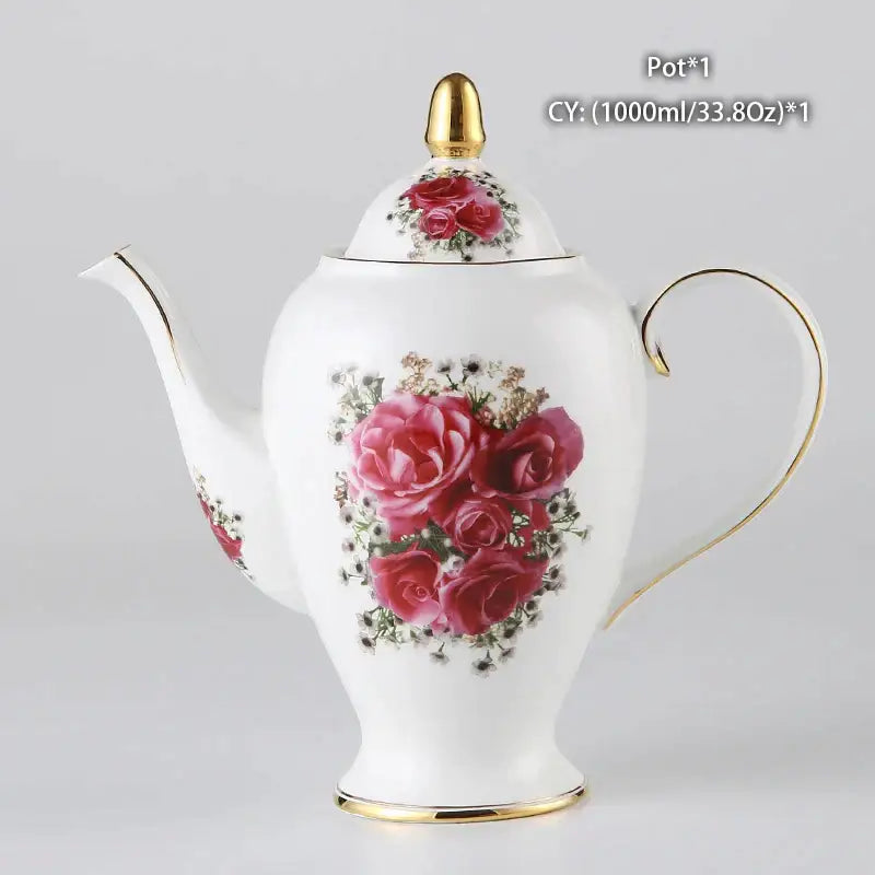 White porcelain bone china teapot with gold trim and vibrant pink rose floral design from decorbites tea set