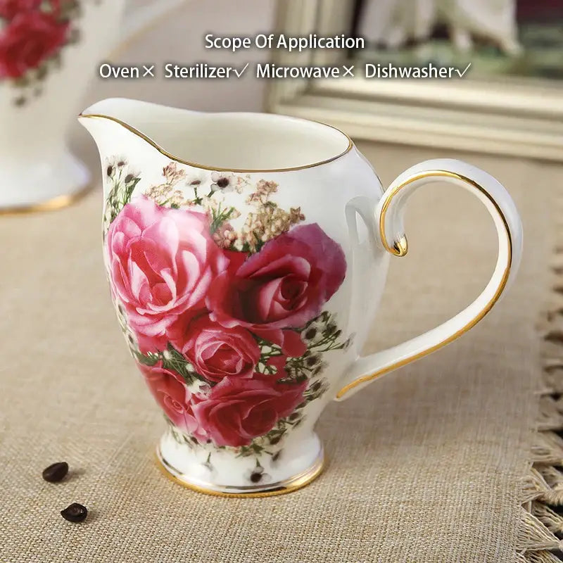 White porcelain creamer with vibrant pink and red roses and gold trim from decorbites bone china tea set
