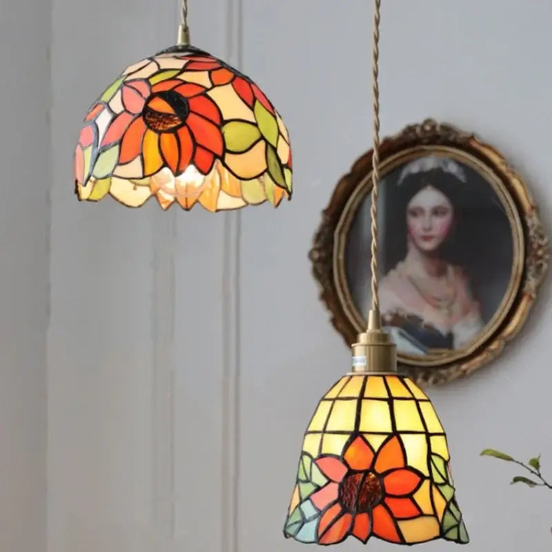 Vibrant floral stained glass pendant light in orange yellow and green hues perfect for dining room decorbites colorful glass led