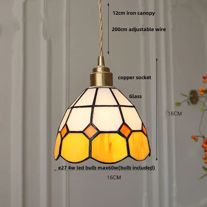 A warm-toned floral stained glass pendant light with cream amber yellow panels and colorful glass led decorbites design