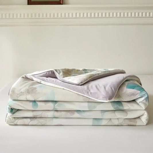 Soft folded floral teal and lavender knitted cotton print summer quilt with plush lining from decorbites knitted cotton