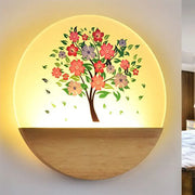 A warm wall light with a floral tree acrylic shade featuring red pink and purple blossoms for bedroom night use