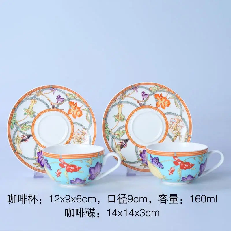 A delicate porcelain bone dinnerware set coffee cup and saucer with vibrant floral pattern on light blue background