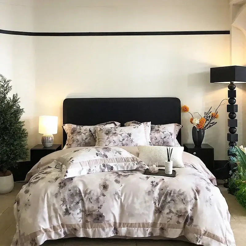 Elegant ivory satin duvet bedding set with gray floral patterns and beige trim made of egyptian cotton bedding